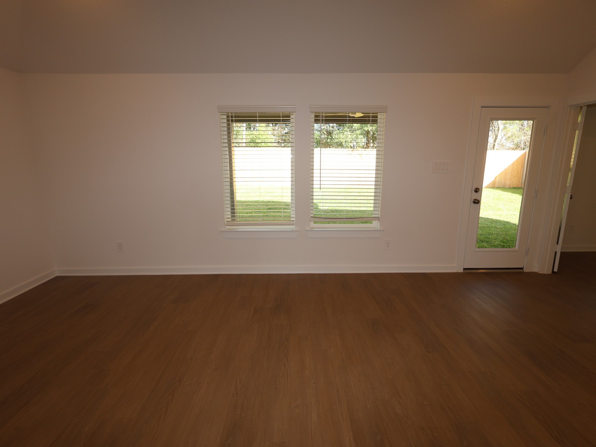 957 Garden Path Drive Willis, TX 77378 - Photo 3 of 37 an empty room with a window