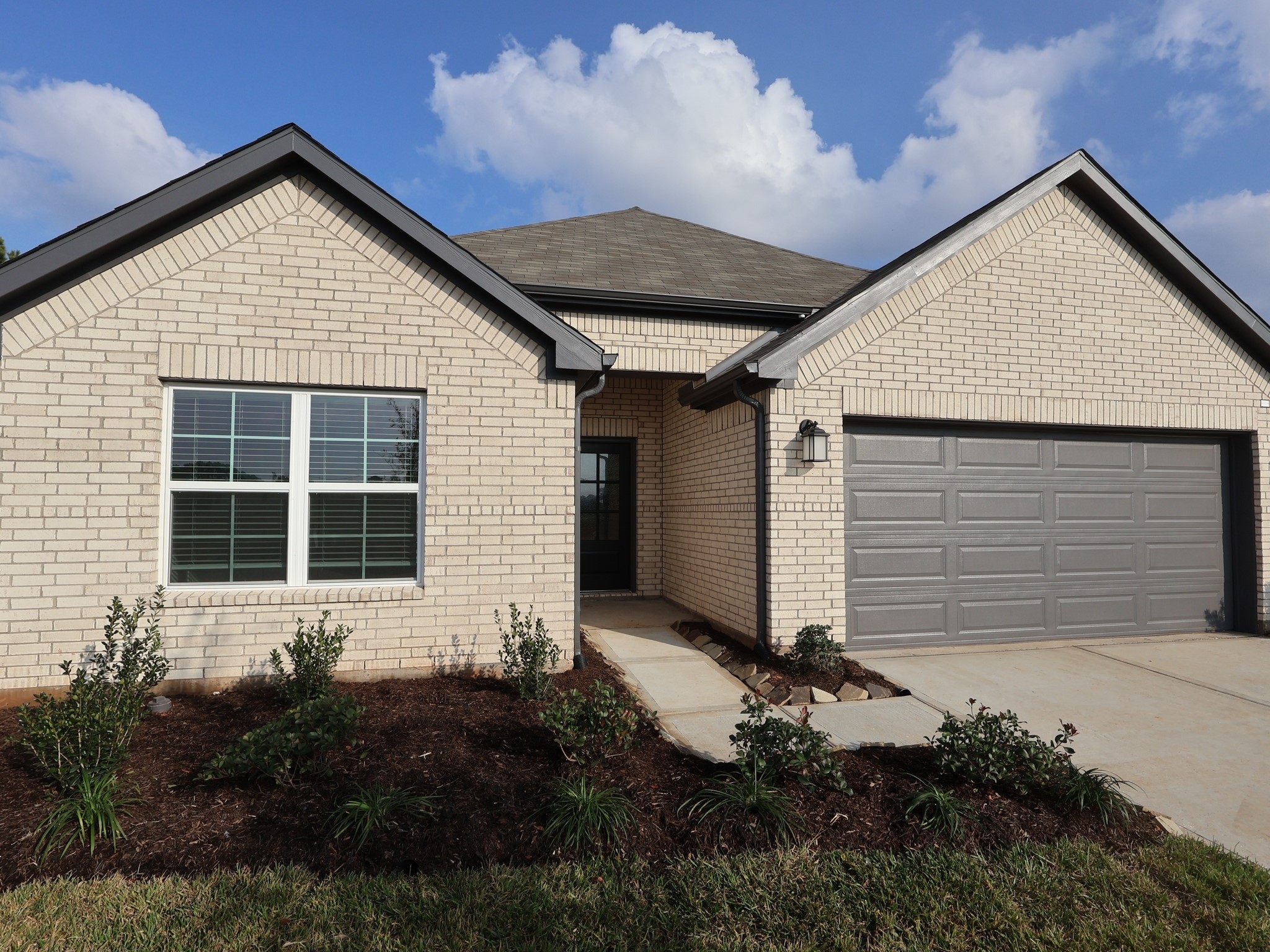 957 Garden Path Drive Willis, TX 77378 - Photo 9 of 37 a front view of house with yard
