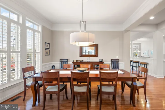 a workspace with furniture and a window