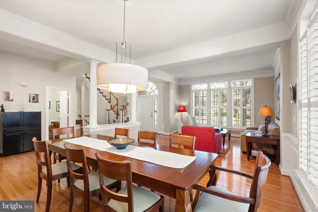 a spacious bedroom with a large bed and a window