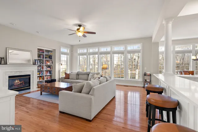 a bathroom with a sink curtain and a mirror