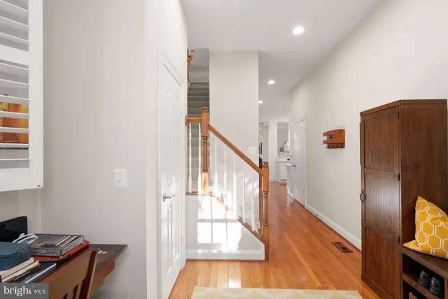 an aerial view of a house with a swimming pool