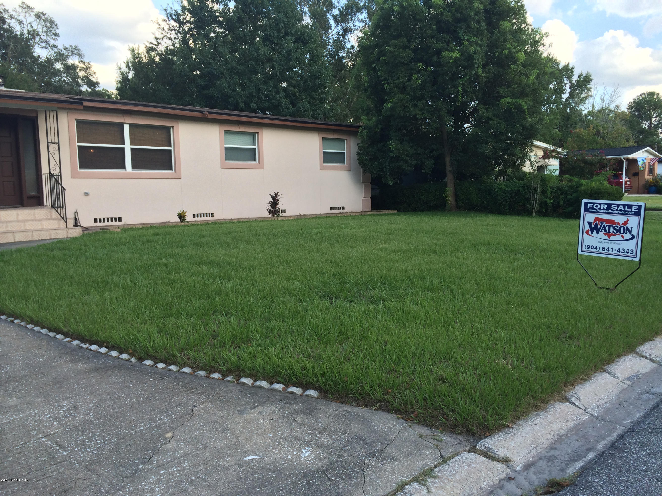 2433 Sam Road Jacksonville, FL 32216 - Photo 2 of 22 a view of a back yard of the house