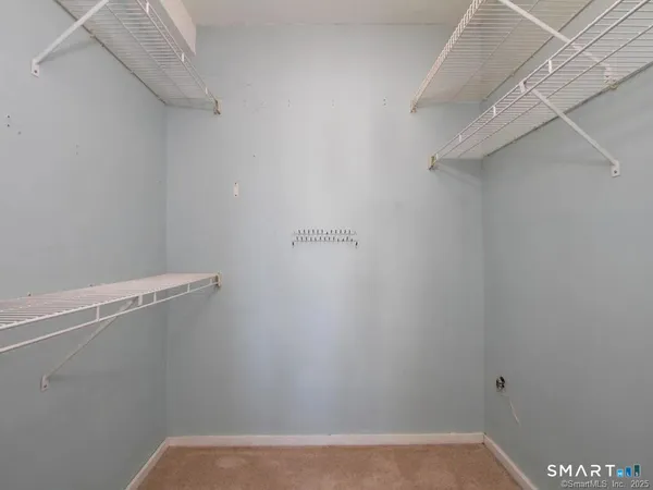 a view of a room with racks on the wall