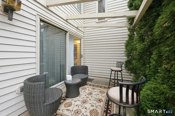 a view of a chairs in patio