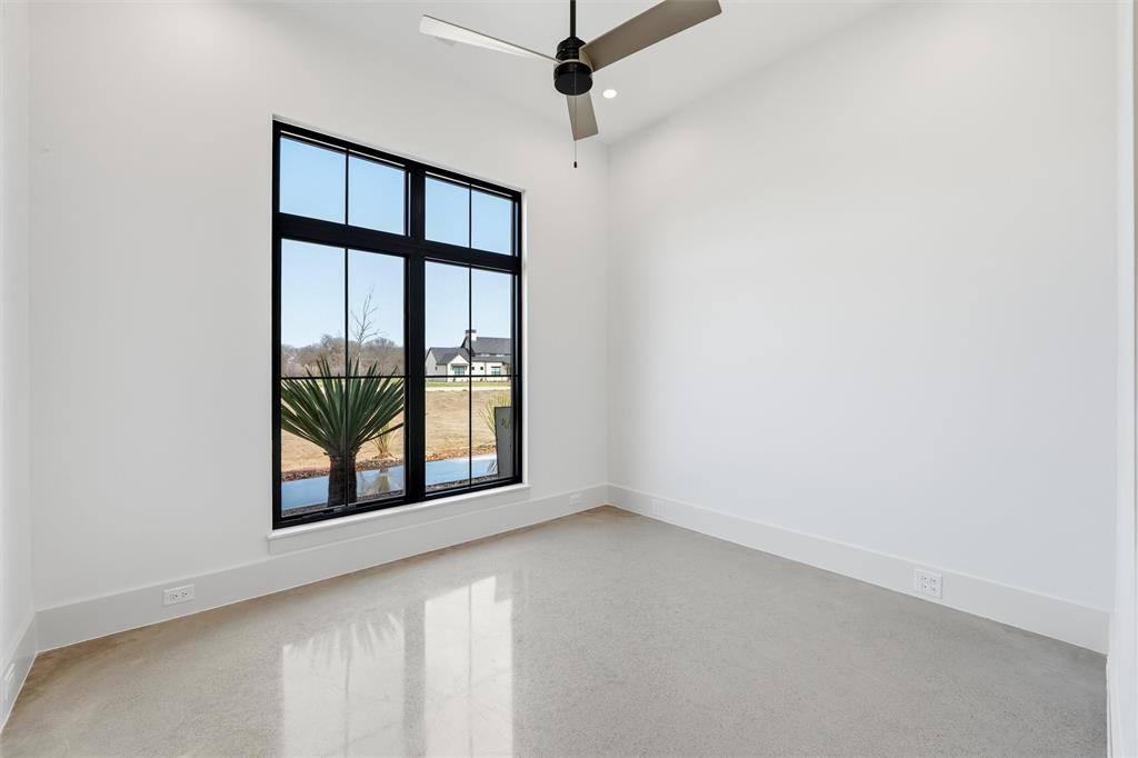 2004 Denali Pass Aledo, TX 76008 - Photo 21 of 40 an empty room with windows and fan