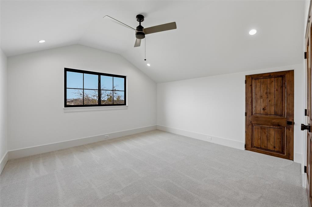 2004 Denali Pass Aledo, TX 76008 - Photo 39 of 40 an empty room with windows and ceiling fan