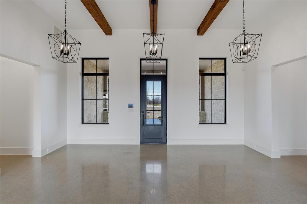 2004 Denali Pass Aledo, TX 76008 - Photo 5 of 40 a view of empty room with windows and chandelier
