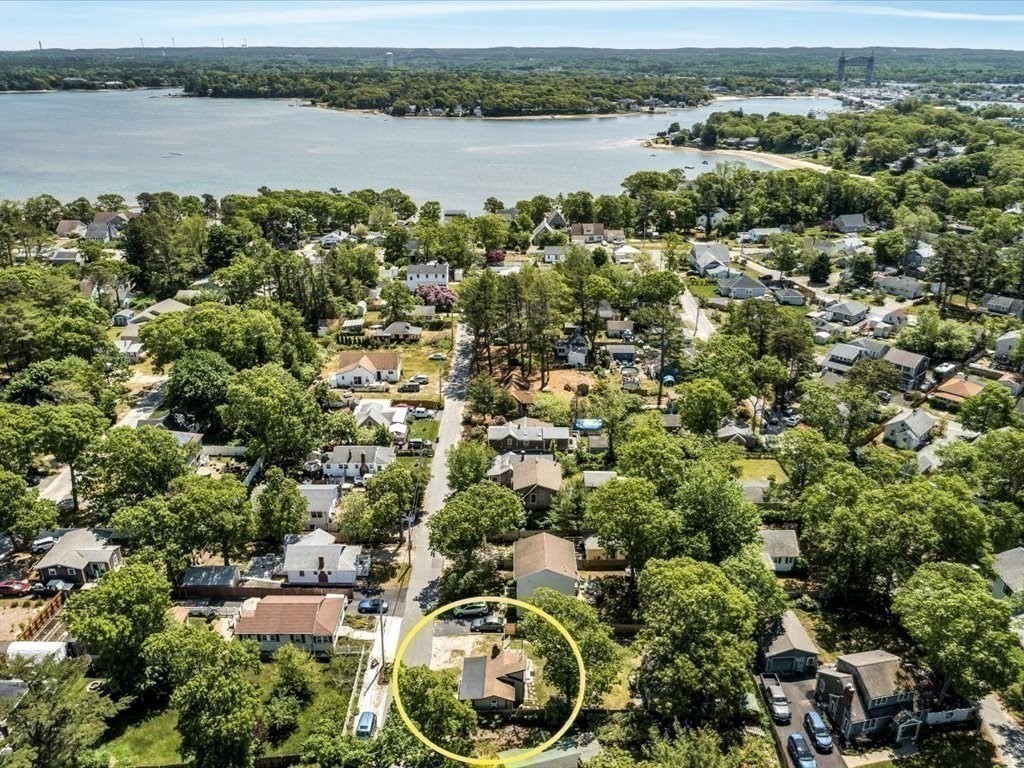 56 Ryder Street Wareham, MA 02532 - Photo 1 of 29 an aerial view of a house with a lake view