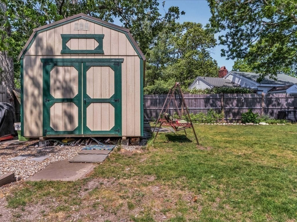 56 Ryder Street Wareham, MA 02532 - Photo 19 of 29 a front view of a house with garden