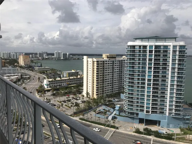 a view of a lake with a city