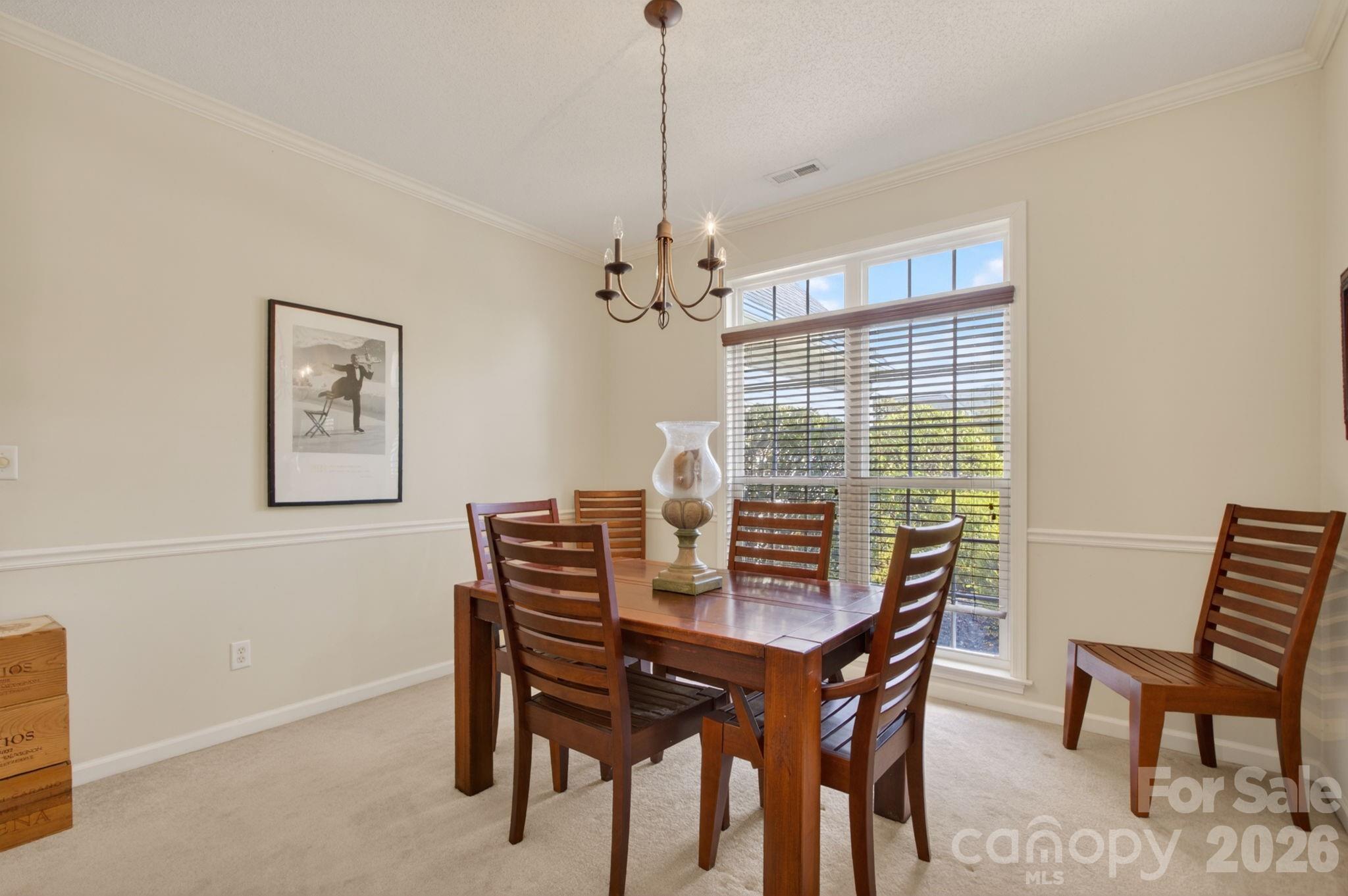 268 Farm Valley Road Fletcher, NC 28732 - Photo 6 of 30 a dining room with furniture a chandelier and window