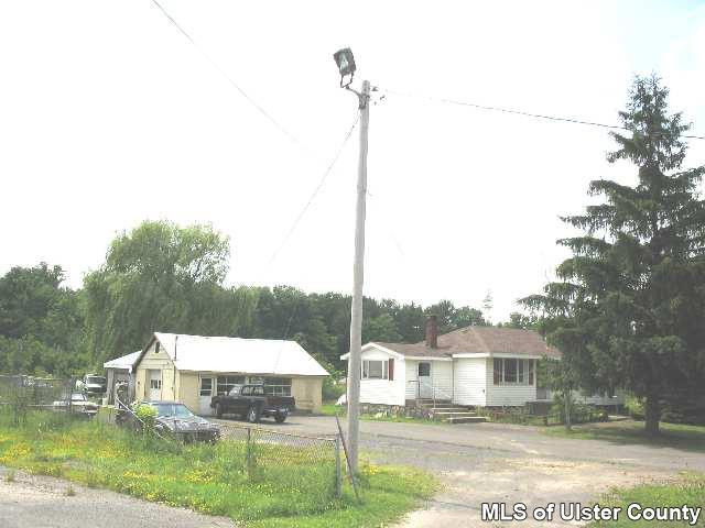 7413 Highway 32 Cairo, NY 12413 - Photo 2 of 3 a house view with a garden space