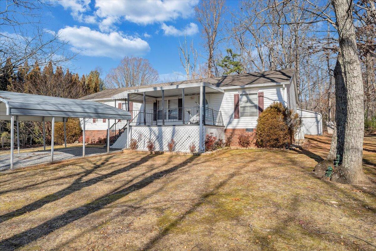 a view of a house with a snow on the background