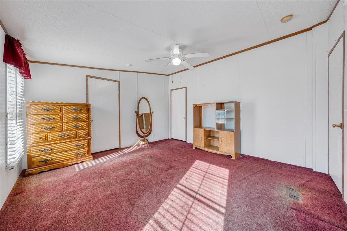 829 Moorman Mill Road Rustburg, VA 24588 - Photo 21 of 45 a view of a livingroom with an empty space and a window