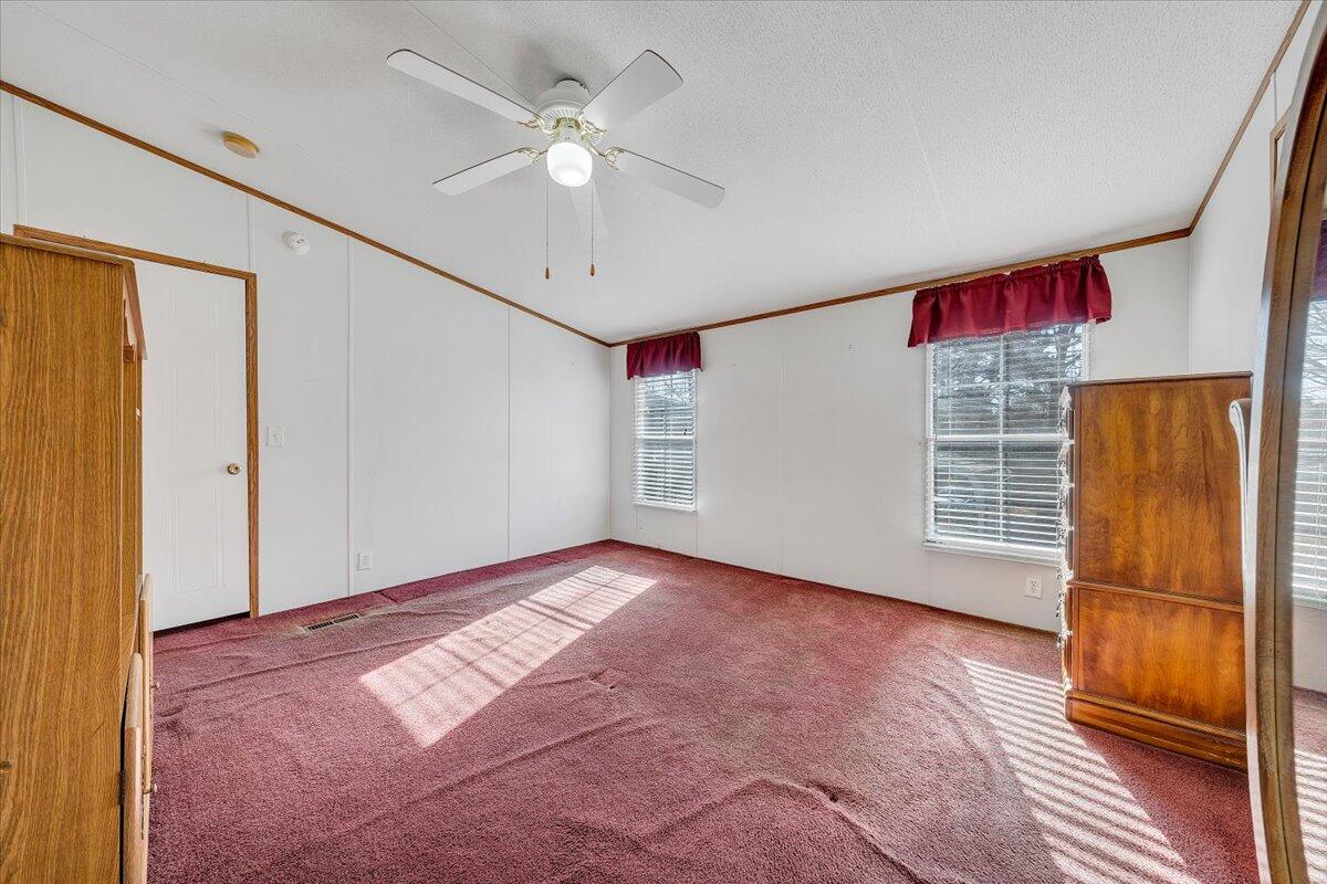 829 Moorman Mill Road Rustburg, VA 24588 - Photo 22 of 45 an empty room with windows and cabinet