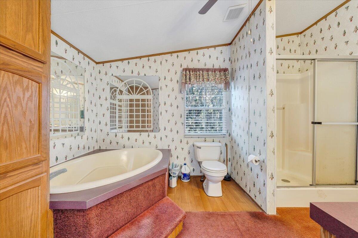 829 Moorman Mill Road Rustburg, VA 24588 - Photo 25 of 45 a spacious bathroom with a bathtub and shower