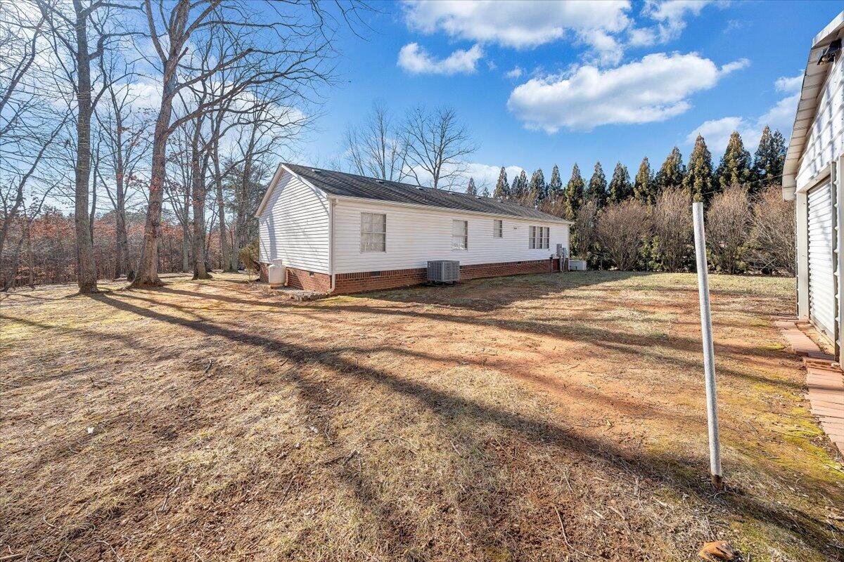 829 Moorman Mill Road Rustburg, VA 24588 - Photo 35 of 45 a view of a house with snow on the road