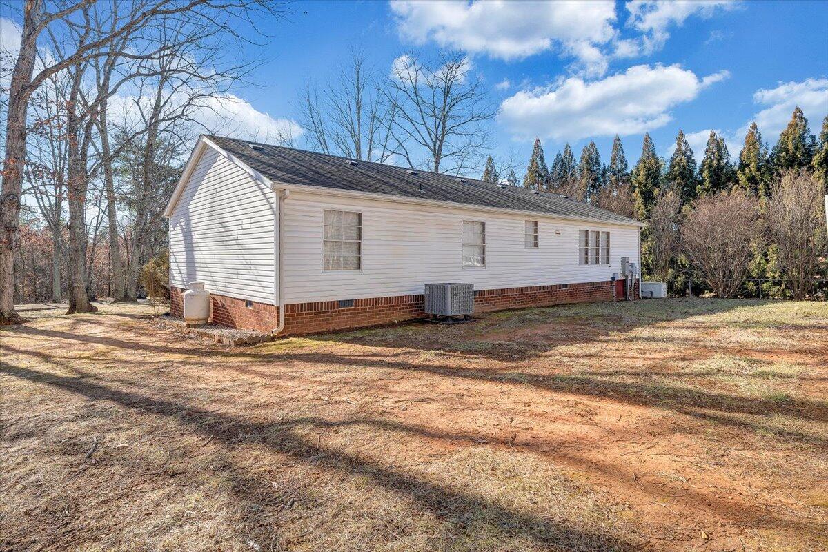 829 Moorman Mill Road Rustburg, VA 24588 - Photo 36 of 45 a view of a house with snow on the road