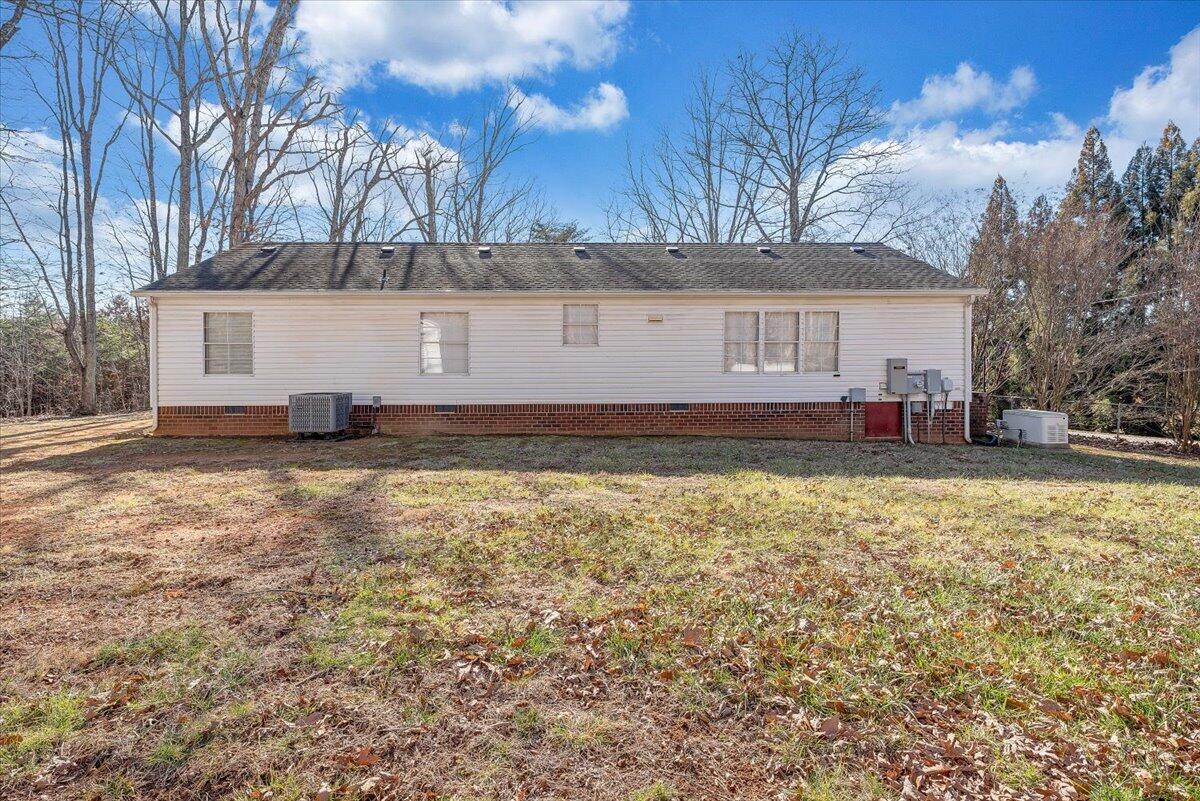 829 Moorman Mill Road Rustburg, VA 24588 - Photo 37 of 45 a view of a house with a yard