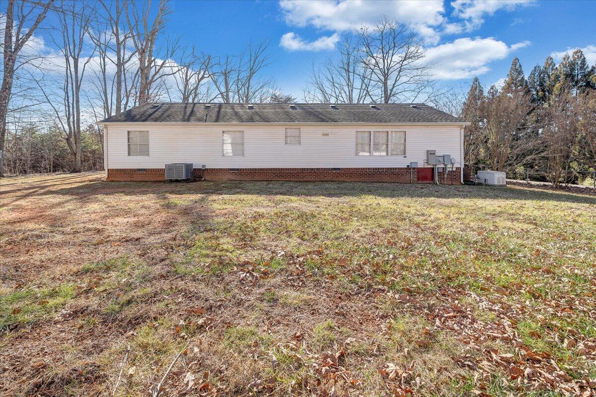 829 Moorman Mill Road Rustburg, VA 24588 - Photo 38 of 45 a view of a house with a yard
