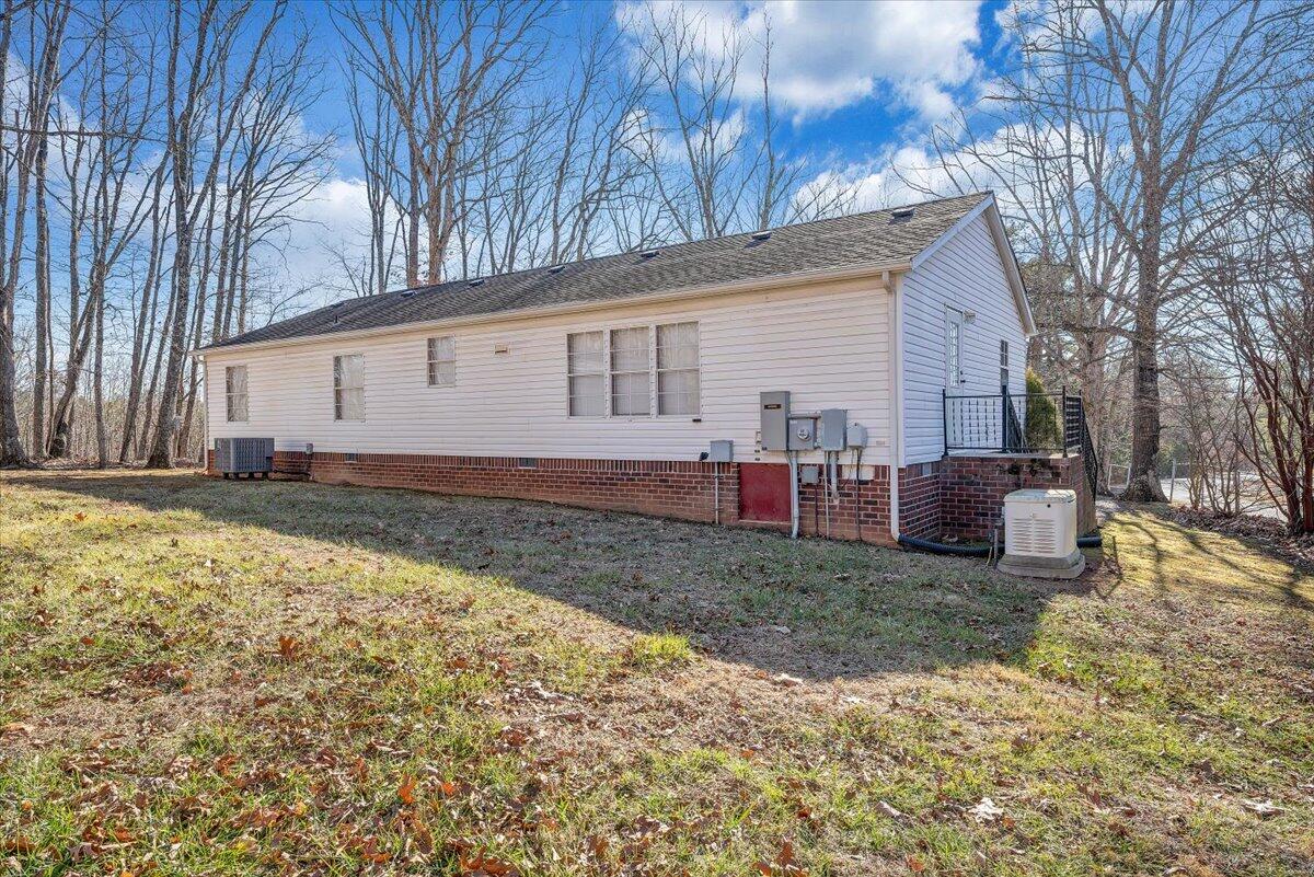 829 Moorman Mill Road Rustburg, VA 24588 - Photo 39 of 45 a view of a house with a yard