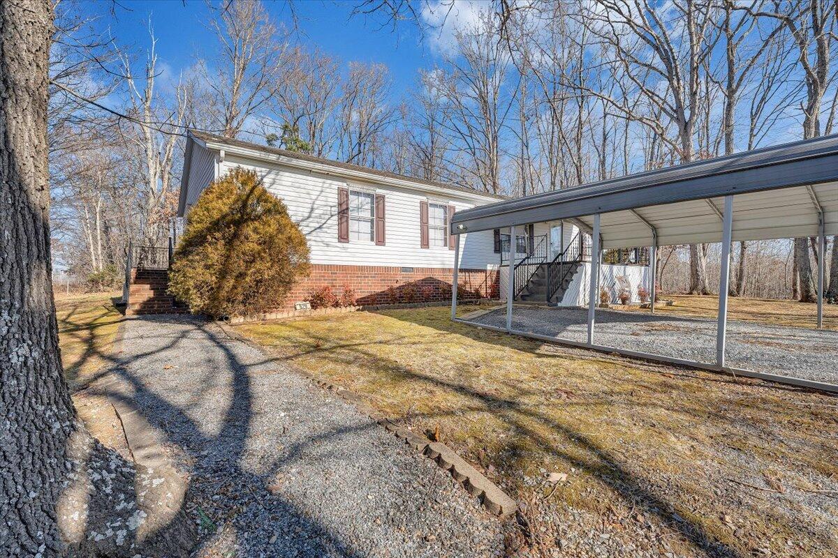 829 Moorman Mill Road Rustburg, VA 24588 - Photo 41 of 45 a view of back yard of the house