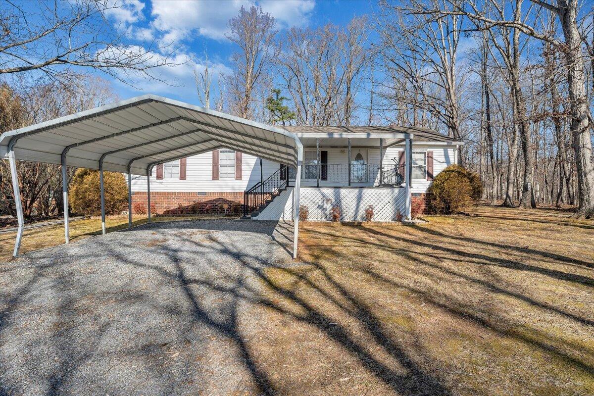 829 Moorman Mill Road Rustburg, VA 24588 - Photo 42 of 45 a view of a house with a yard