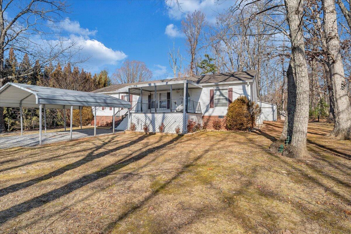 829 Moorman Mill Road Rustburg, VA 24588 - Photo 44 of 45 a view of a house with a yard