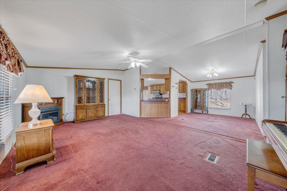 829 Moorman Mill Road Rustburg, VA 24588 - Photo 5 of 45 a spacious bedroom with a bed and a window