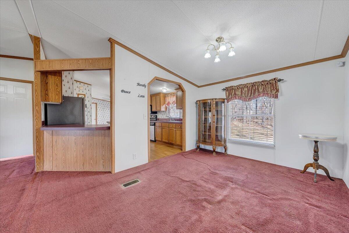 829 Moorman Mill Road Rustburg, VA 24588 - Photo 8 of 45 a view of a livingroom with a staircase