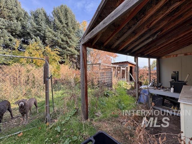 7880 Sweet Ola Highway Sweet, ID 83670 - Photo 21 of 24 View of yard with a patio area and an outbuilding