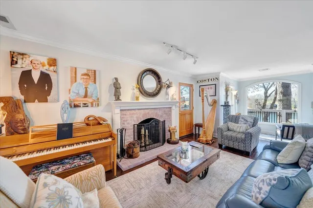 a kitchen with granite countertop a sink stainless steel appliances and cabinets