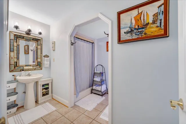 a bed room with a bed and a tv