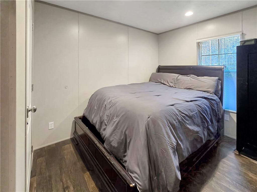 615 Generostee Church Road Starr, SC 29684 - Photo 10 of 20 This cozy bedroom features durable flooring and ample natural light, creating a comfortable living space.