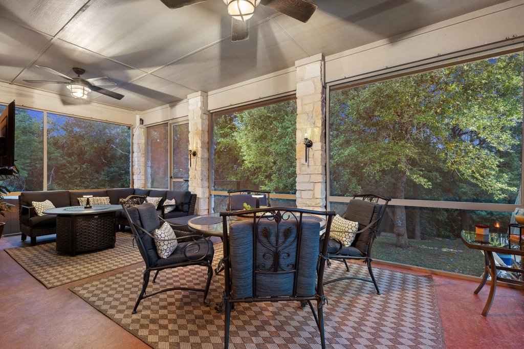 15208 Nightingale Lane Austin, TX 78734 - Photo 40 of 40 Sunroom / solarium with a ceiling fan and an outdoor living / dining area