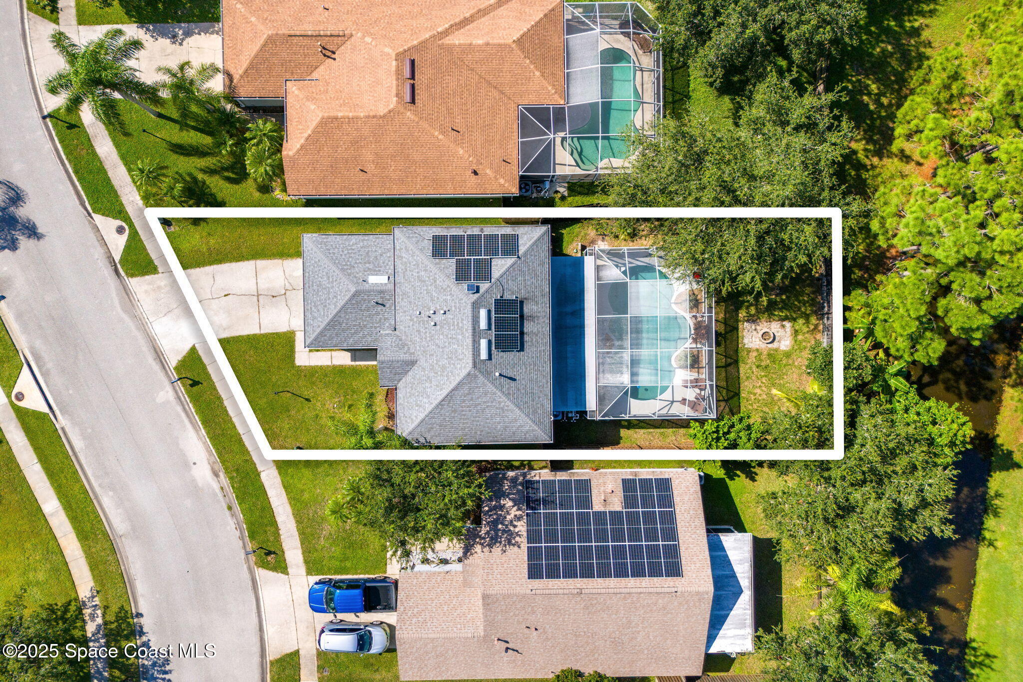 1249 White Oak Circle Melbourne, FL 32934 - Photo 28 of 34 an aerial view of a house with a garden