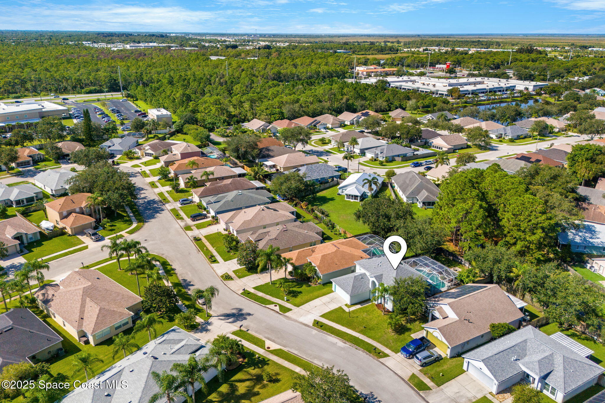 1249 White Oak Circle Melbourne, FL 32934 - Photo 29 of 34 an aerial view of residential houses with outdoor space