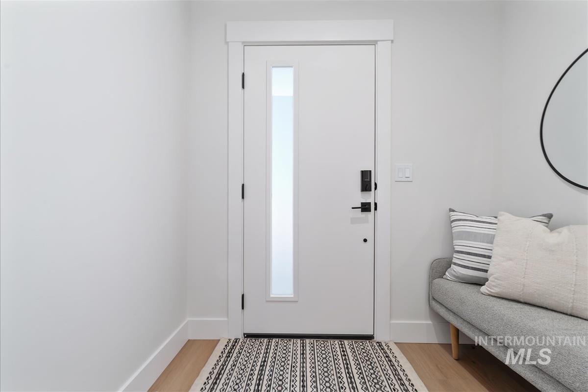1719 South Federal Way Boise, ID 83705 - Photo 23 of 32 Entrance foyer with light wood-style floors and baseboards