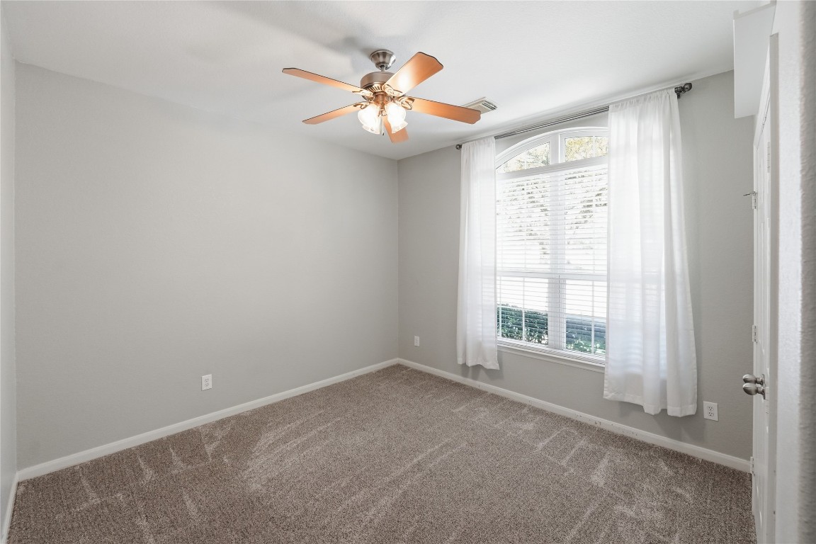 5803 Deleon Trail Drive Spring, TX 77379 - Photo 20 of 33 a view of an empty room with a window