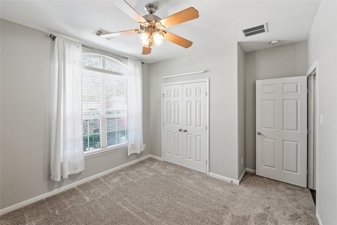 5803 Deleon Trail Drive Spring, TX 77379 - Photo 22 of 33 a view of an empty room with a window