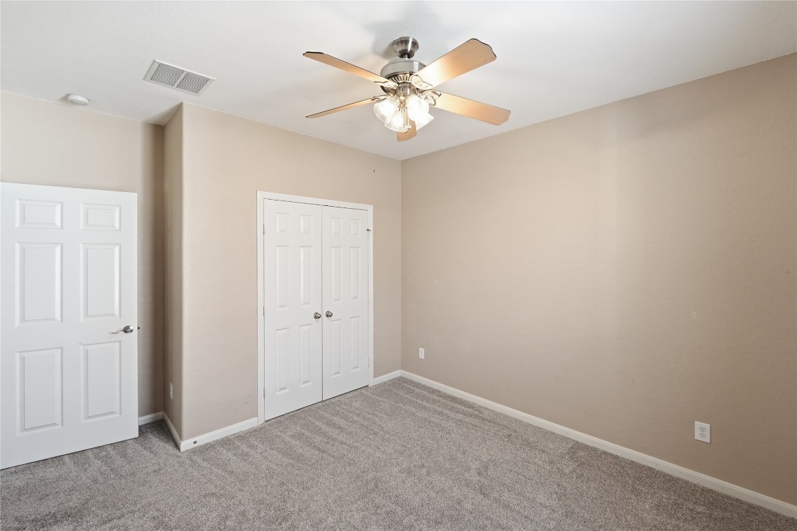 5803 Deleon Trail Drive Spring, TX 77379 - Photo 24 of 33 a view of an empty room with a window
