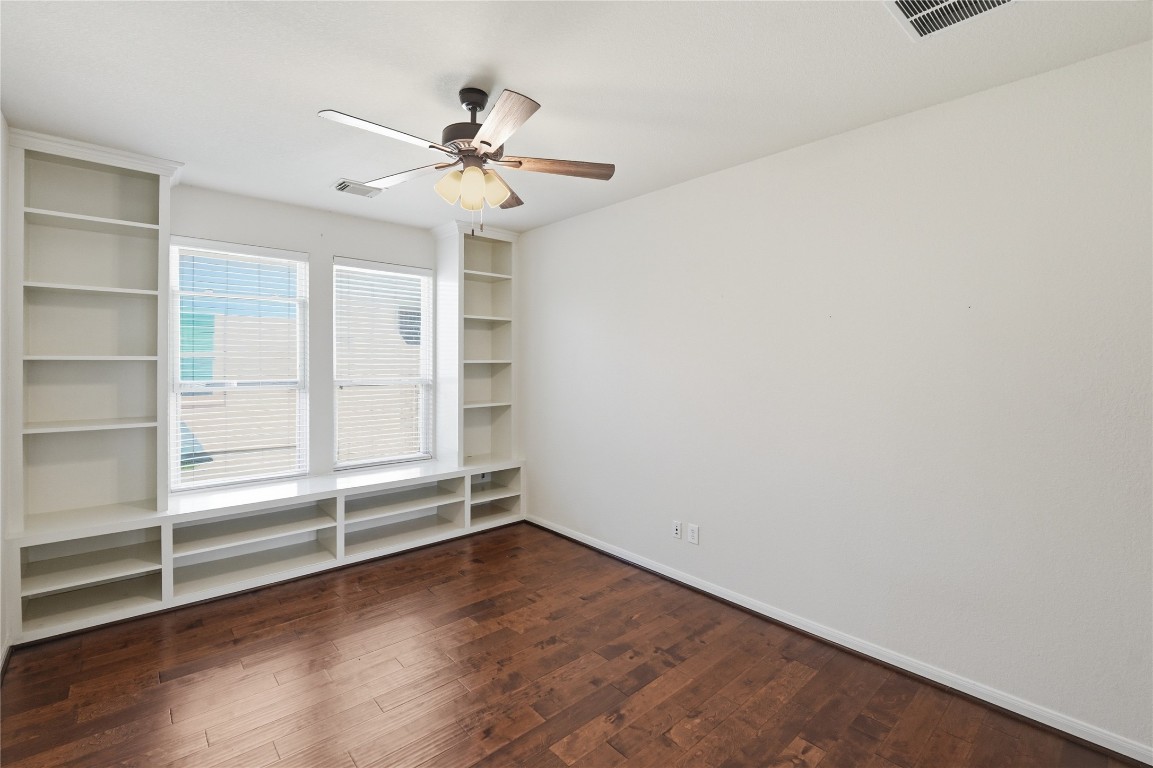 5803 Deleon Trail Drive Spring, TX 77379 - Photo 27 of 33 wooden floor in an empty room with a window