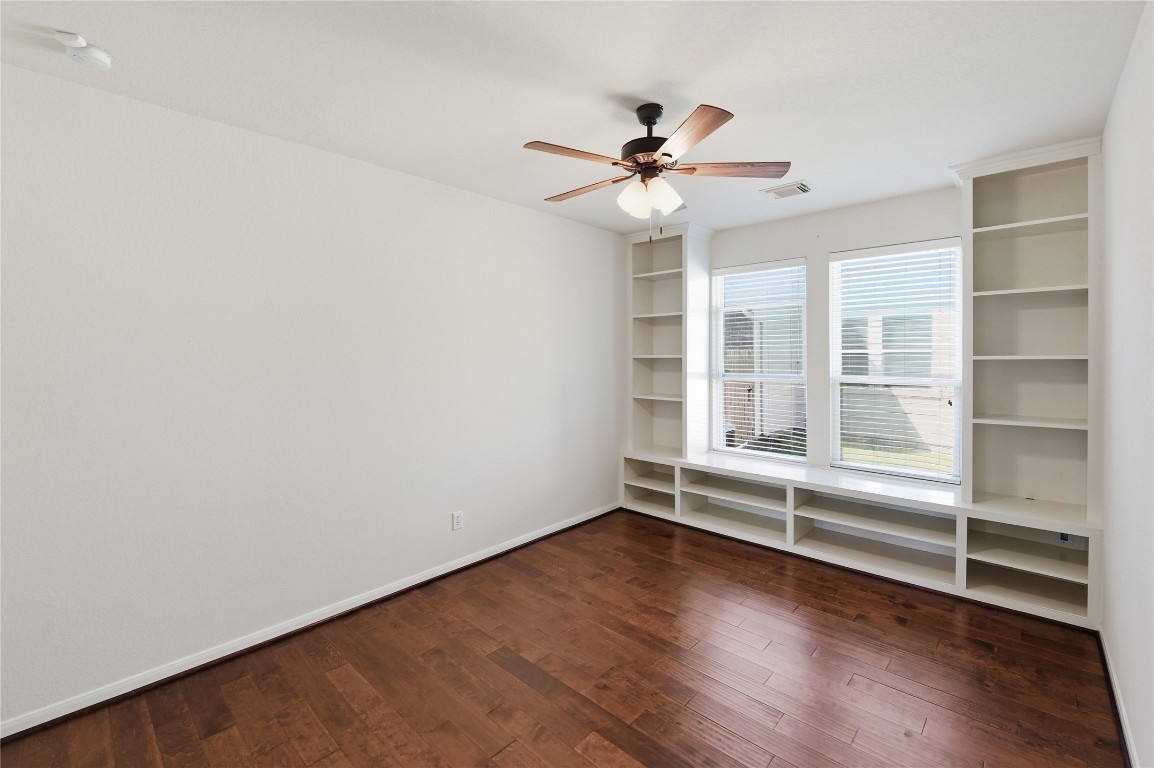 5803 Deleon Trail Drive Spring, TX 77379 - Photo 28 of 33 wooden floor in an empty room with a window