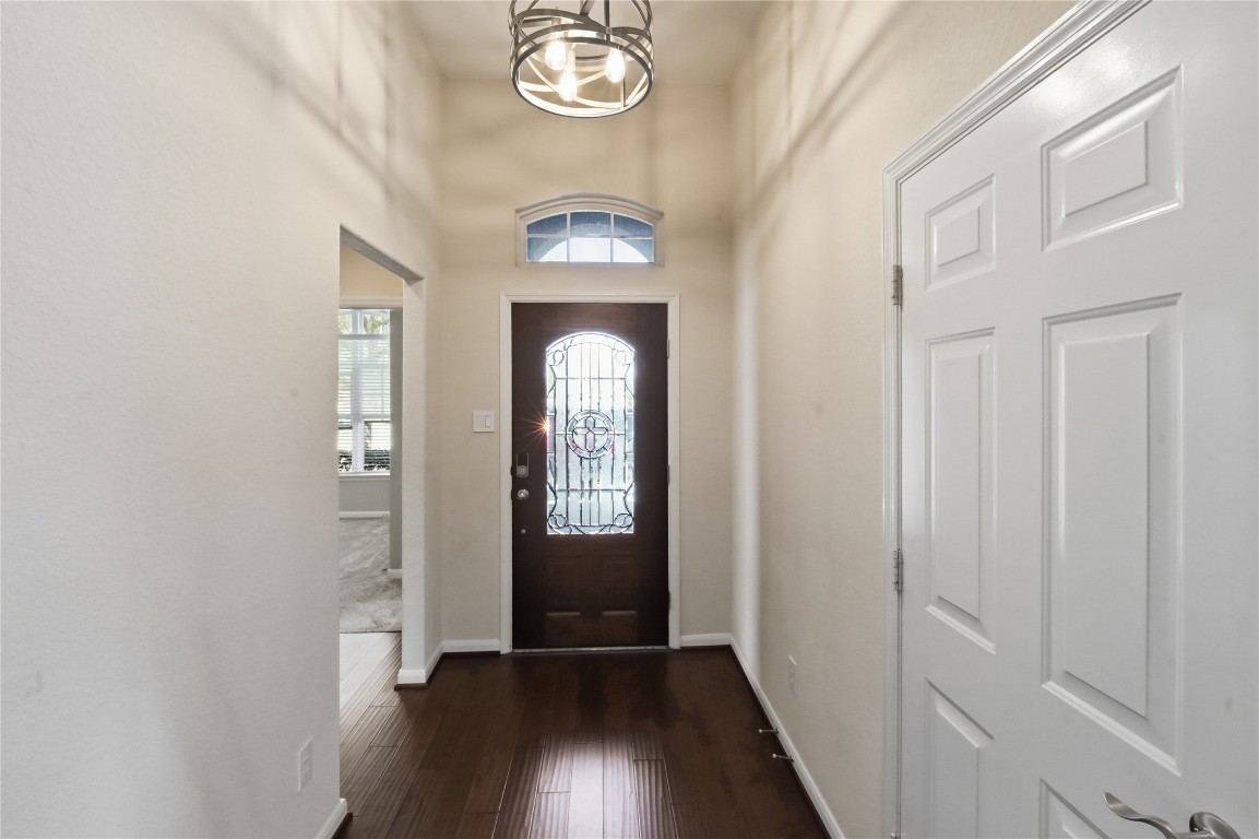 5803 Deleon Trail Drive Spring, TX 77379 - Photo 30 of 33 a view of a room with wooden floor and windows