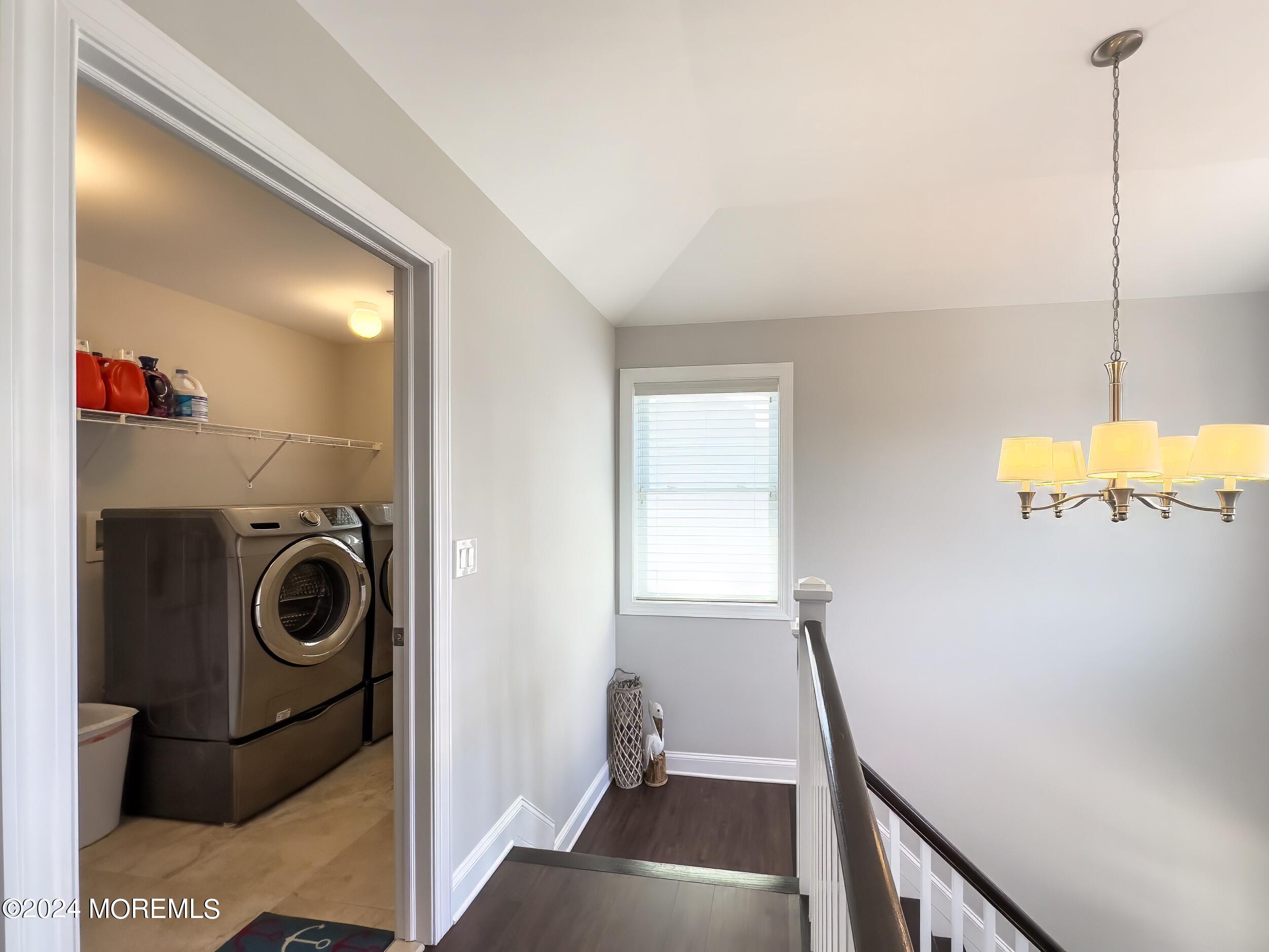 646 Drum Point Road, Unit B Brick, NJ 08723 - Photo 29 of 46 a view of a storage and utility room with washer and dryer
