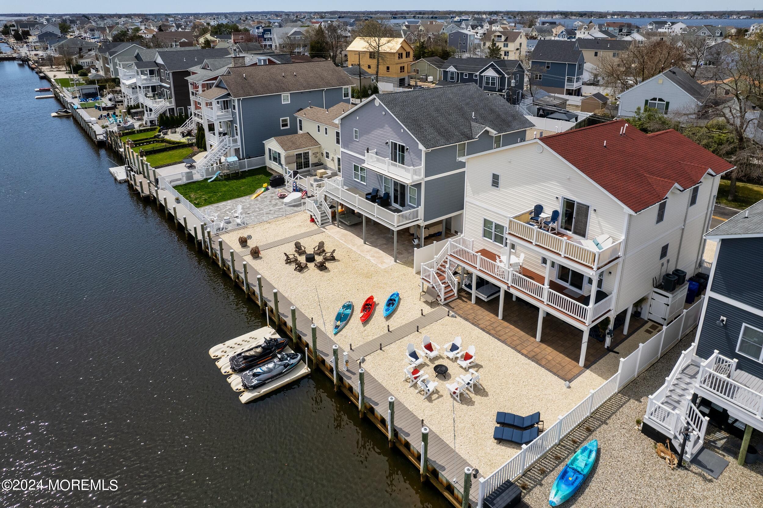 646 Drum Point Road, Unit B Brick, NJ 08723 - Photo 40 of 46 an aerial view of a house with roof deck