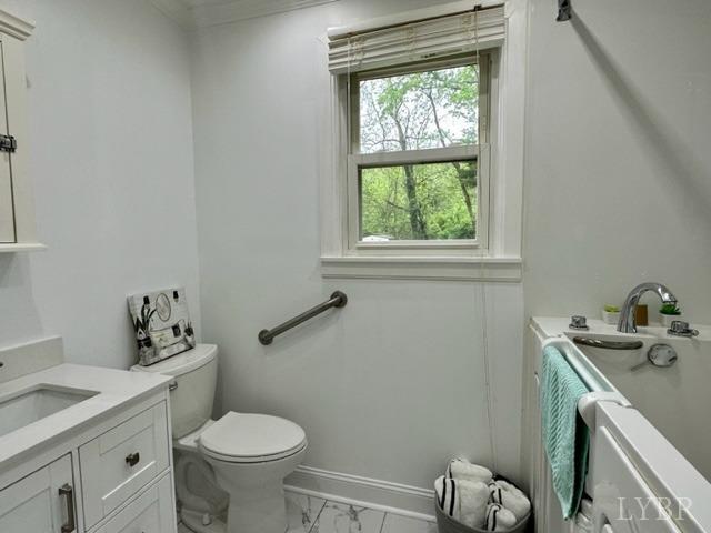 114 Coffee Road Lynchburg, VA 24503 - Photo 13 of 25 a bathroom with a sink toilet and window