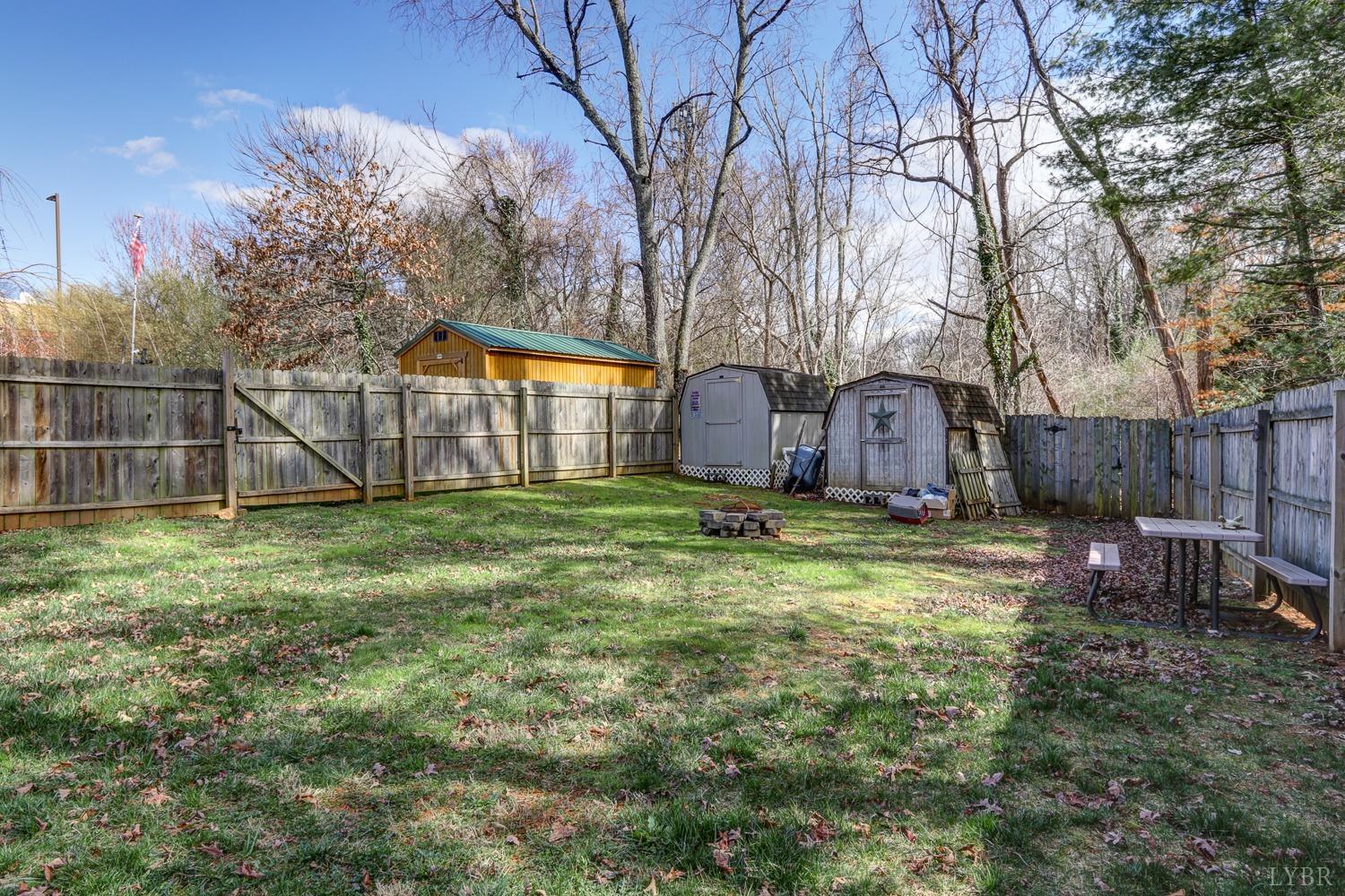 114 Coffee Road Lynchburg, VA 24503 - Photo 20 of 25 a view of a house with backyard and a tree