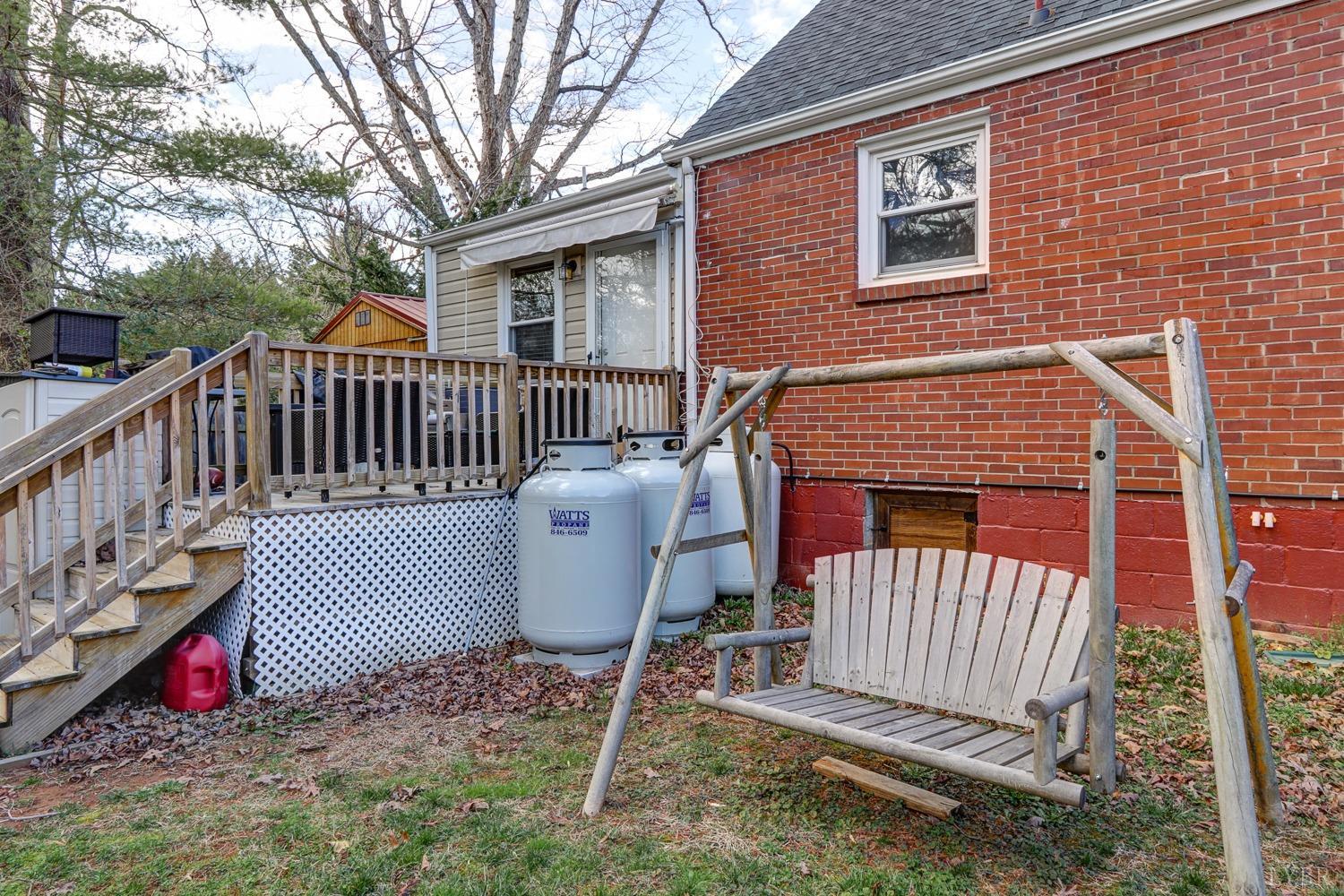 114 Coffee Road Lynchburg, VA 24503 - Photo 22 of 25 a view of a roof deck with two chairs and a potted plant